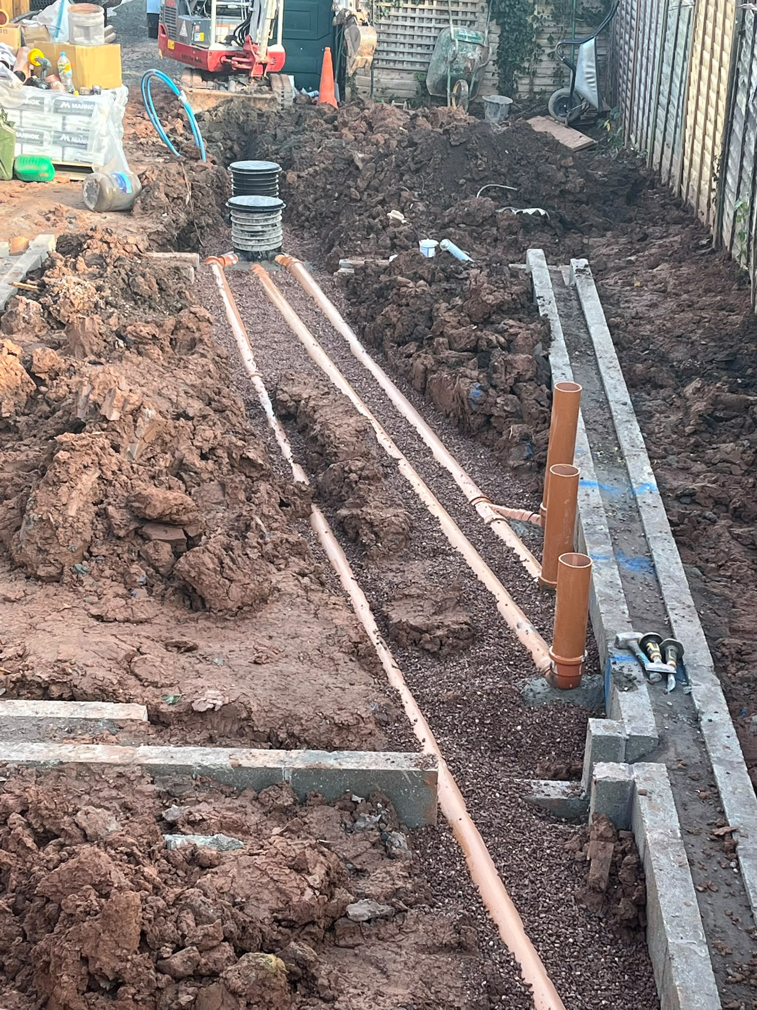 Underground drainage installation in progress